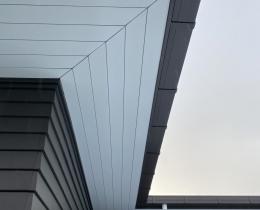 Ribon 900mm soffit with 5mm negative detail butt joined mitres. Pacific White. Fascia Spouting Colour Ironsand